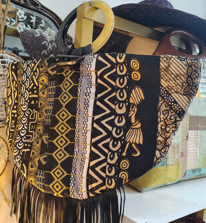 Black denim with Leather Fringe Crescent Bag, gold accents